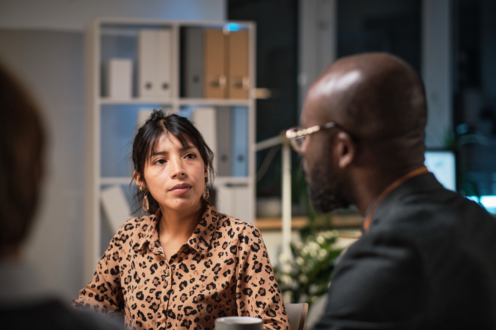 A manager talking with a team member as the team works through a rocky stage